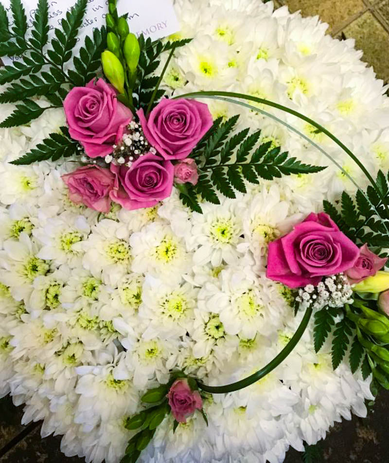FUNERAL POSY BASED IN PINKS AND WHITES