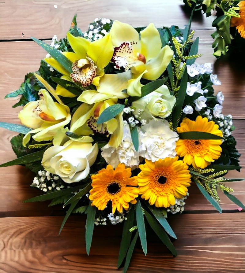 FUNERAL POSY BASED IN YELLOWS AND WHITES
