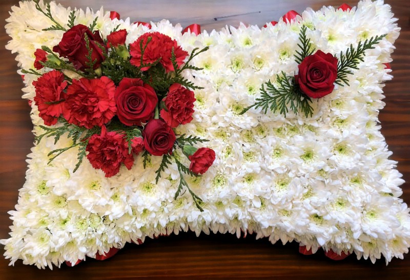 Funeral Pillow With Red Corsage